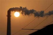 Smoke billows from a power plant in Xiangfan, central China's Hubei province
