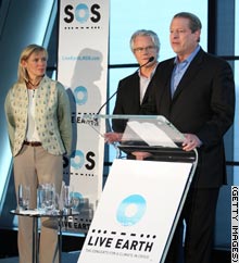 Former U.S. Vice President Al Gore, with Cathy Zoi, of the Alliance for Climate Protection, and concert founder Kevin Wall