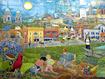 The 9' X 14' ceramic mural by Gregory Aliberti, entitled 'Strive for Harmony'. The mural hangs in the community room of the Rapid Station.