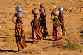 Walks of two hours with heavy containers for water, are not uncommon
