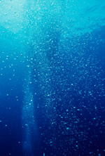 Methane bubbles in the ocean, from thawing and evaporating methane ice