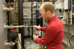 EAWAG Collecting water samples at the Lengg lake water facility of Zurich Waterworks