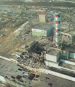 The nuclear reactor after the disaster. Reactor 4 (center). Turbine building (lower left). Reactor 3 (center right). Click for larger image.